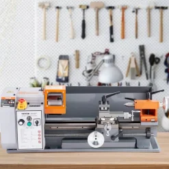 VEVOR Benchtop Metal Lathe, 7'' x 13.78'', offers precise metalworking with a 0-2200 RPM variable speed, powered by a 500W brush motor and durable metal gears. Includes a tool box for precise part